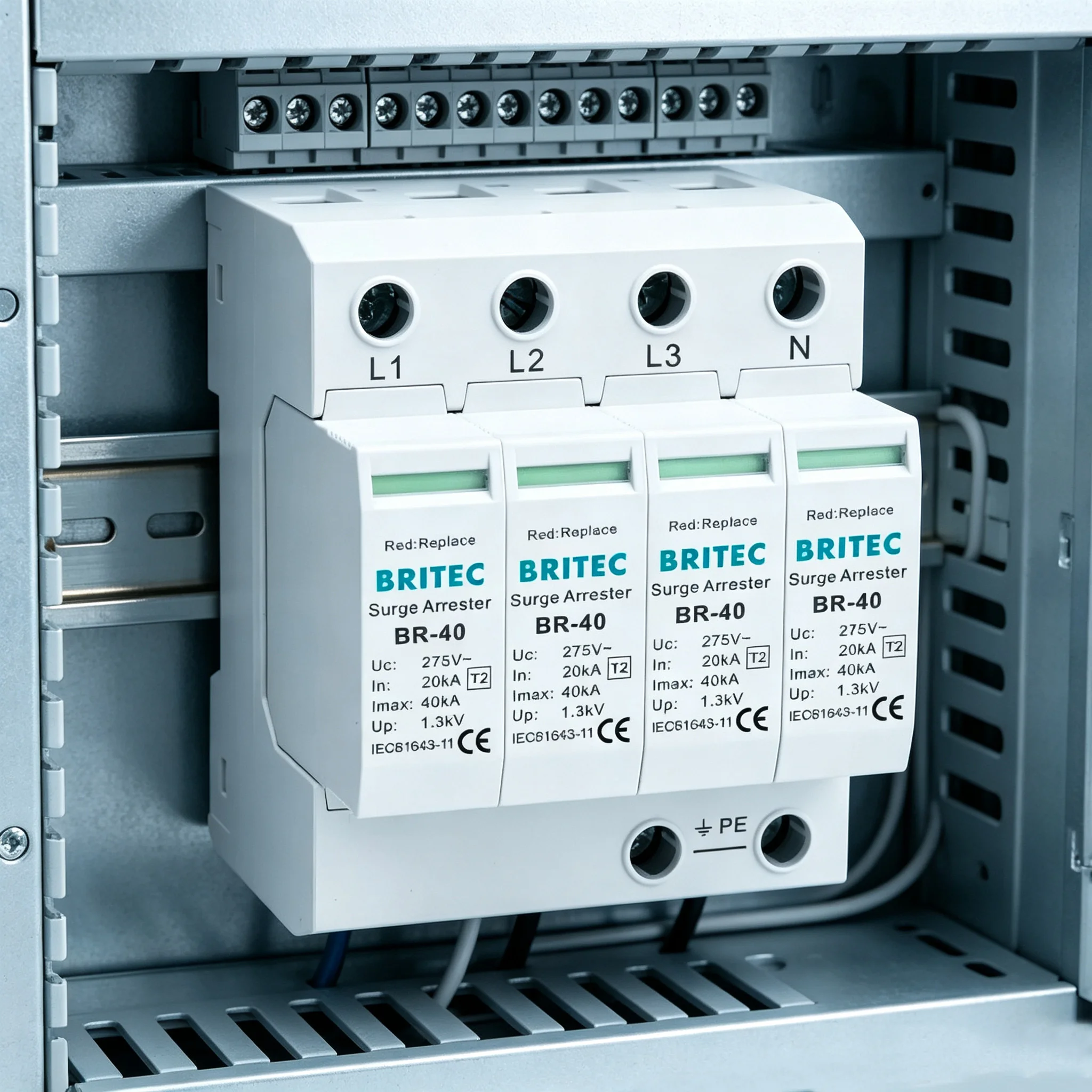 BR-40 4P Type 2 40kA surge protective device installed in a distribution board with green status windows visible
